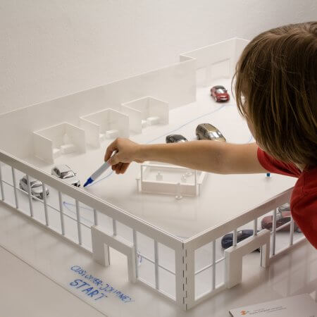 Automotive Retail Lab model of a car showroom which functions as a 3D whiteboard @wissen:stadt ©Center for HCI